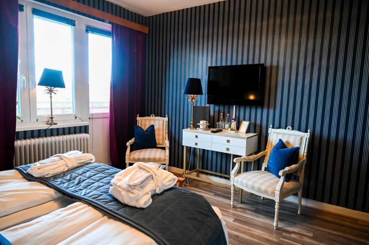 Palace Hotell ฮุลท์สเฟรด ภายนอก รูปภาพ